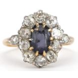 18ct gold blue spinel and diamond cluster ring, the larger diamonds approximately 3.20mm in