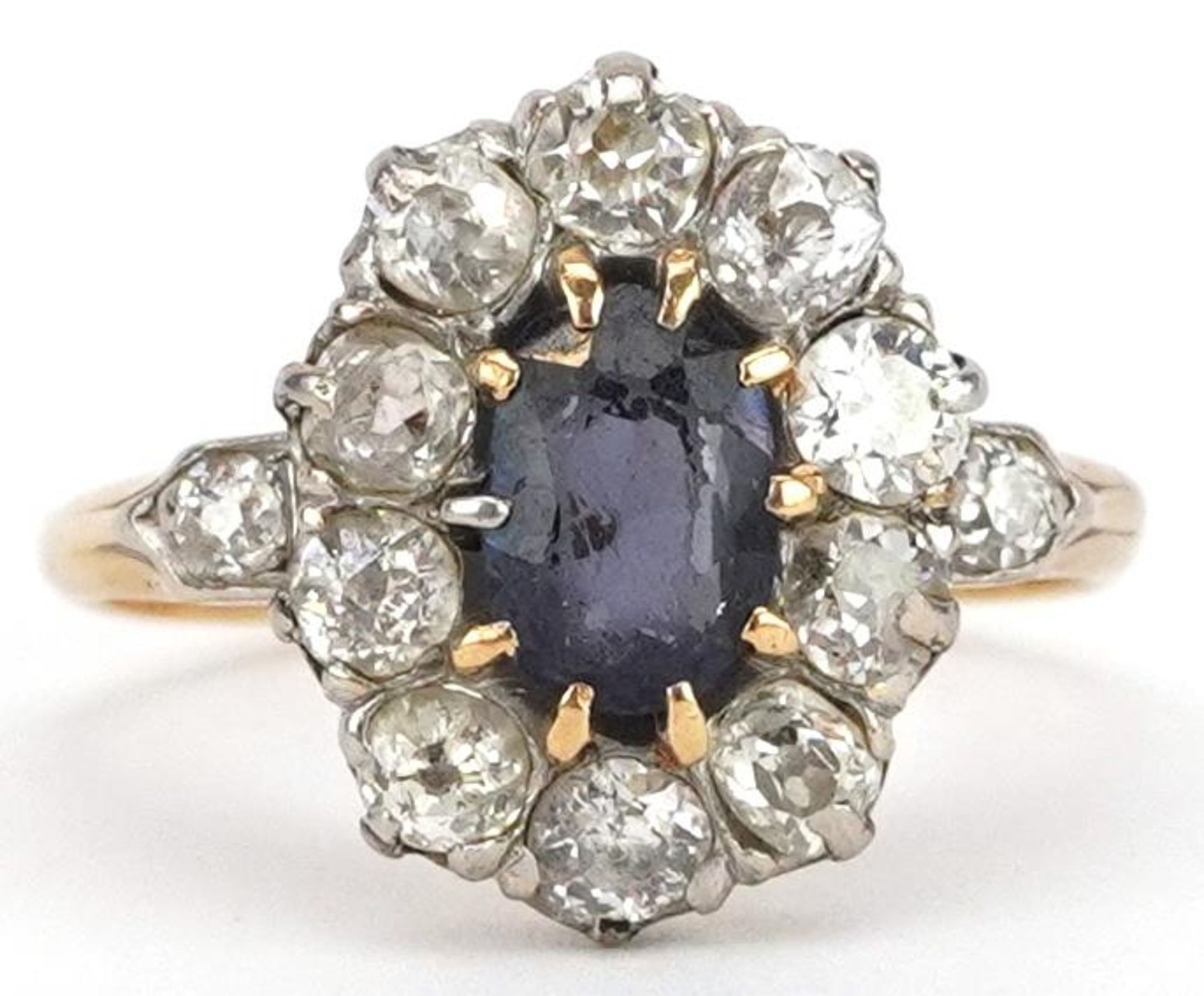 18ct gold blue spinel and diamond cluster ring, the larger diamonds approximately 3.20mm in