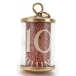9ct gold emergency ten shilling note charm, 2.6cm high, 3.2g : For further information on this lot