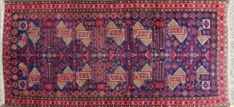 Rectangular Persian rug having an allover repeat geometric design, 230cm x 110cm : For further