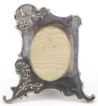 Edwin Jordan & Harry Raybould, Art Nouveau silver easel photo frame, relief decorated with