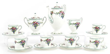 Wedgwood six place coffee service decorated with fruit comprising coffee pot, six coffee cans with