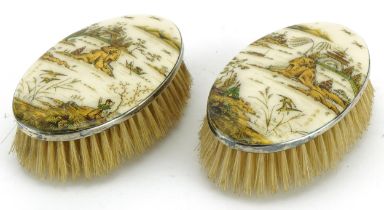 Henry Clifford Davis, pair of George V silver and enamel brushes decorated in the chinoiserie