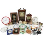 Large collection of clocks including wall clocks, mantle clocks and travel clocks : For further