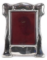 Williams Birmingham Ltd, Art Nouveau silver plated easel photo frame with bevelled glass, 33cm x