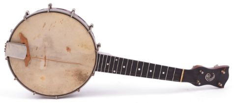 The Whirle four string banjo ukulele with case, 55cm in length : For further information on this lot