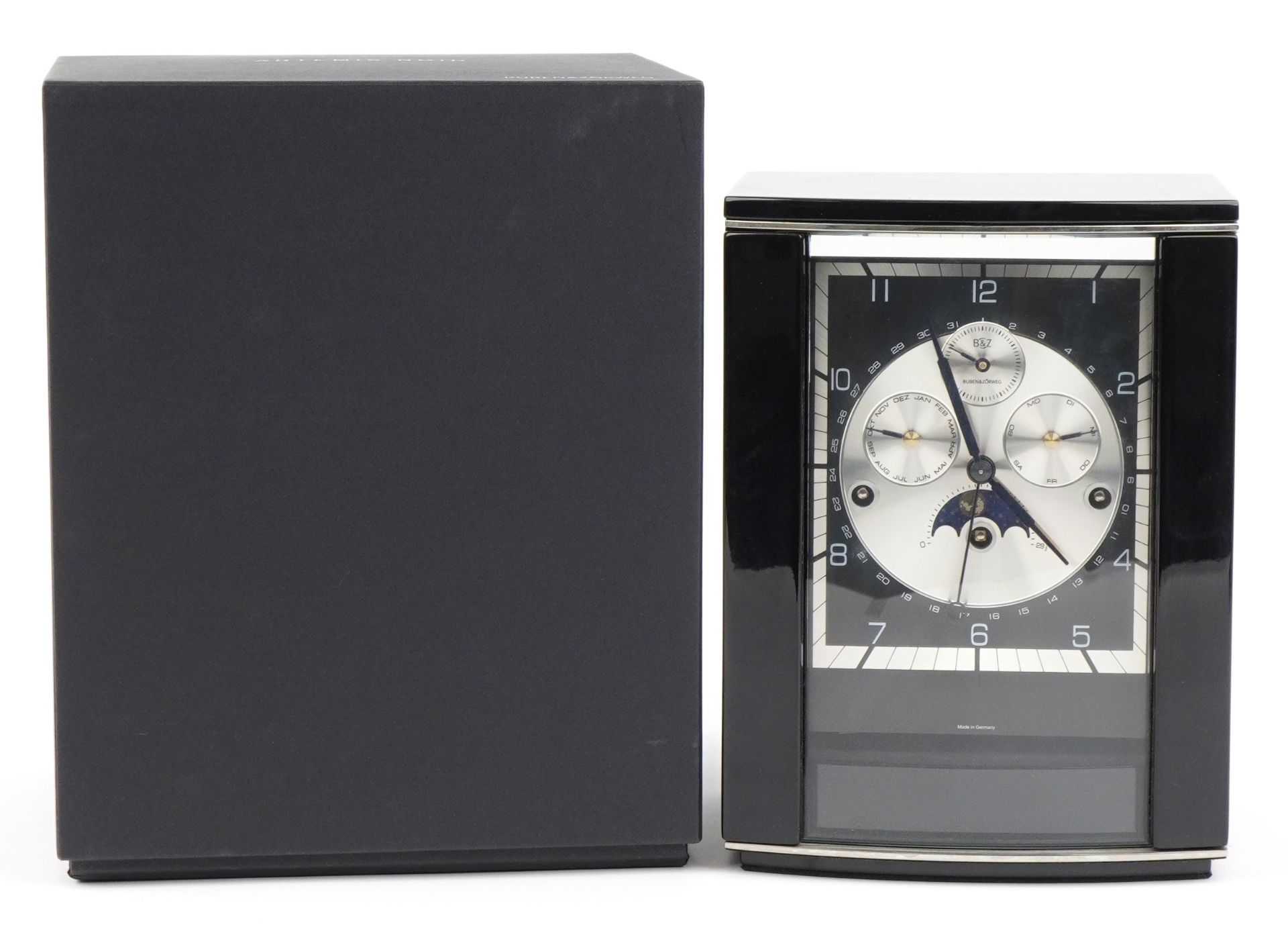 Buben & Zorweg, German Artemis Noir mantle clock with moon phase dial having Arabic numerals, with