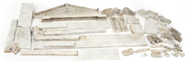 Selection of early 19th century marble surrounds including a door frame carved with flowers and