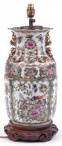 Large Chinese Canton porcelain vase table lamp raised on hardwood stand, hand painted in the famille