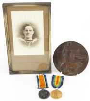 British military World War I medal group relating to C E Fisher comprising World War I pair