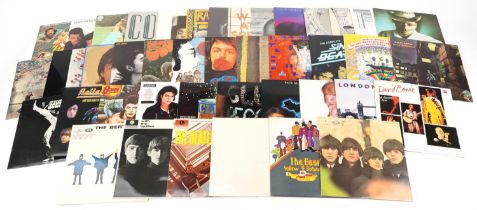 Vinyl LP records including The Rolling Stones, Paul McCartney, The Beatles, Stevie Wonder and Rod