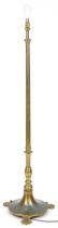 Victorian brass standard lamp converted for electric use on lion paw feet, 140cm high : For