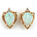 Pair of 9ct gold opal and diamond stud earrings, 1.1cm high, 2.0g : For further information on