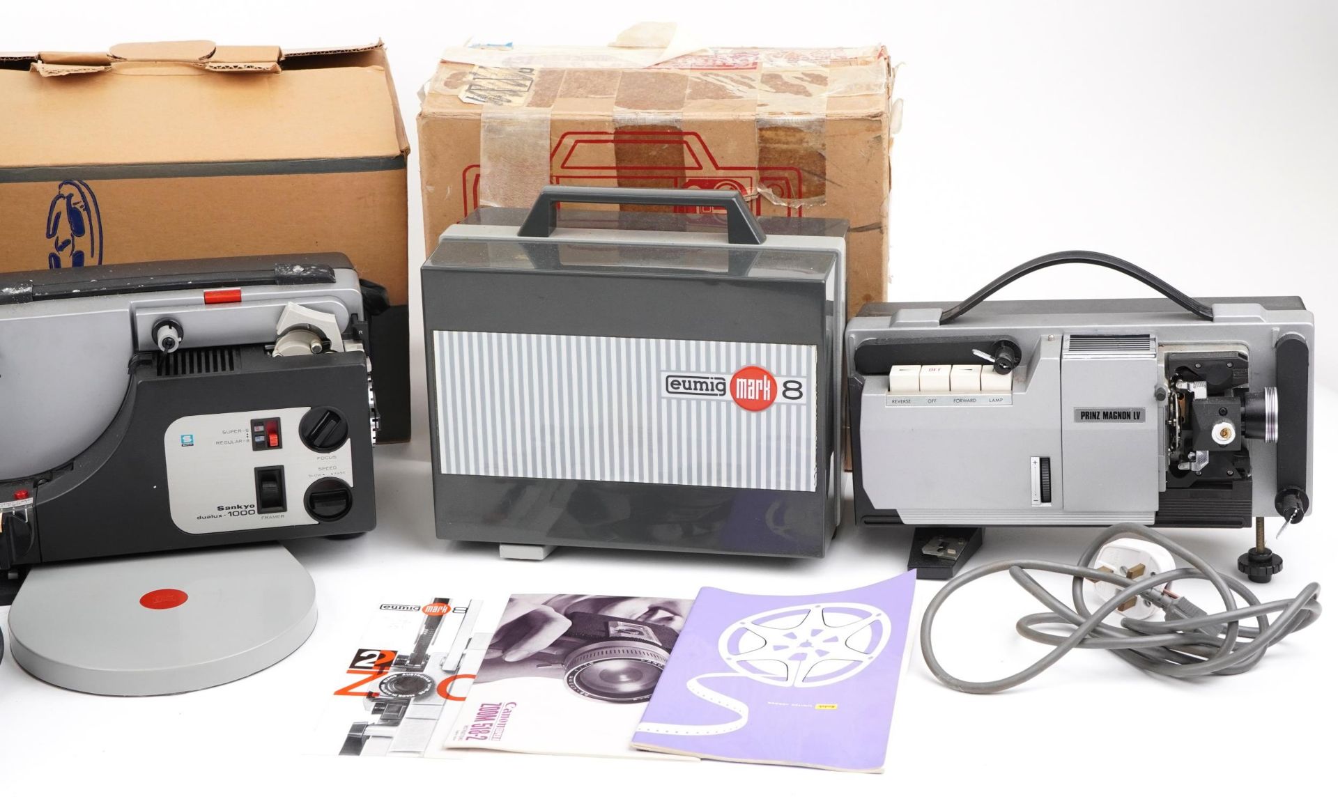 Four vintage film projectors and accessories, some with boxes comprising Eumig MK 8, Sankyo Dualux - Image 4 of 4
