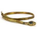 Antique 14ct gold serpent bangle set with a cabochon sapphire and emerald eyes, the head stamped