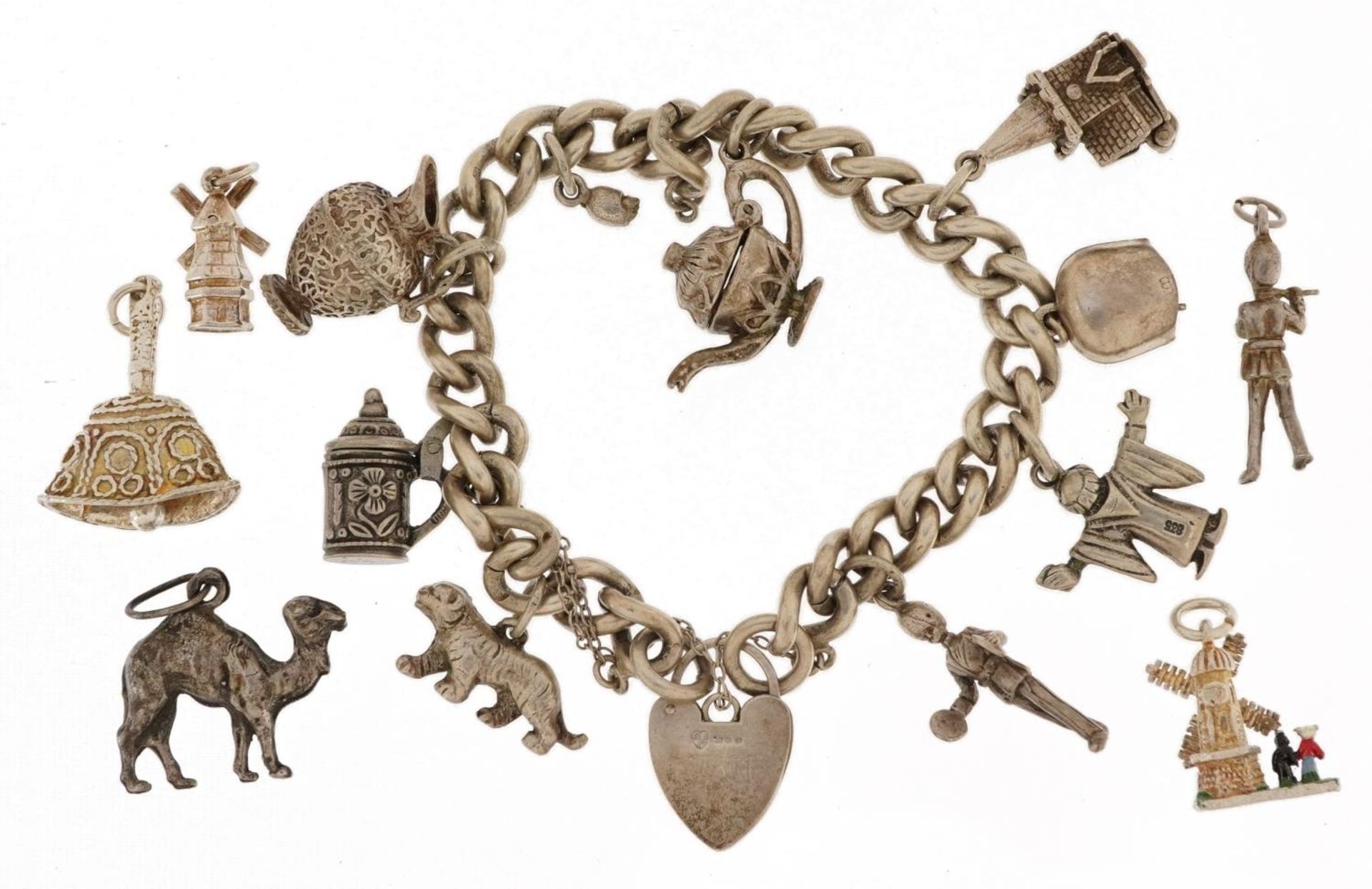 Silver charm bracelet with a selection of mostly silver charms including enamelled windmill, opening - Bild 2 aus 3