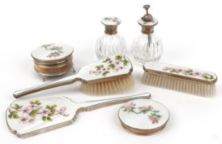 Seven silver and guilloche enamel vanity items including hand mirror, clothes brush, jewel box and
