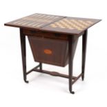 Edwardian inlaid mahogany folding games table on tapering legs with chess, backgammon and cribbage