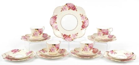 Aynsley teaware hand painted with roses including four trios, pattern no B4773, the largest 22cm