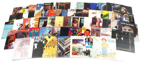 Vinyl LP records including Rod Stewart, Blondie, Queen, David Bowie, Bob Segal and Eric Clapton :