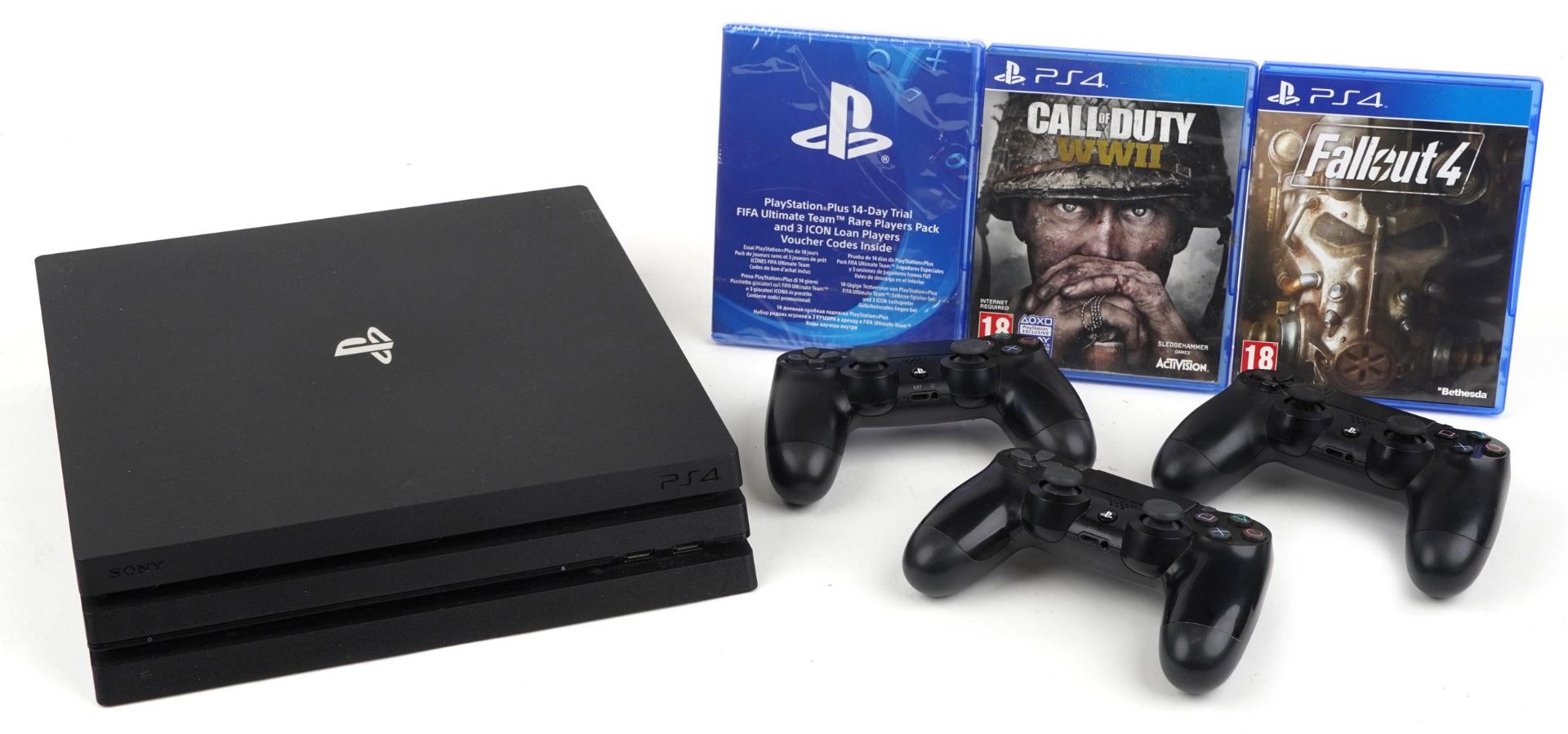 Sony PlayStation 4 games console with three controllers and two games : For further information on
