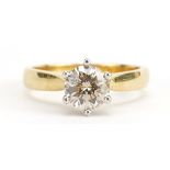 18ct gold diamond solitaire ring housed in a Winegartens tooled leather box, the diamond