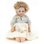 Simon & Halbig, German bisque headed doll with jointed limbs impressed SH1079 3 1/2, 30cm high : For