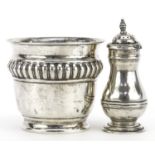 Edwardian silver cash pot and a silver baluster shaped caster, the largest 8.5cm high, total 67.2g :