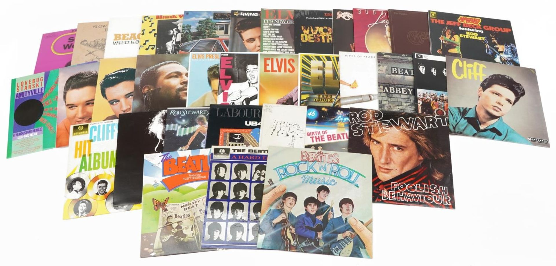 Vinyl LP records including UB40, The Beatles, Cliff Richard, Rod Stewart, Elvis Presley, The