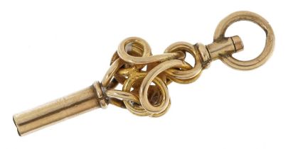Unmarked gold watch key charm, tests as 9ct gold, 3.2cm in length, 2.0g : For further information on