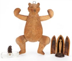 Treen objects including a carved Black Forest bear surmounted on twin divisional glass dish and