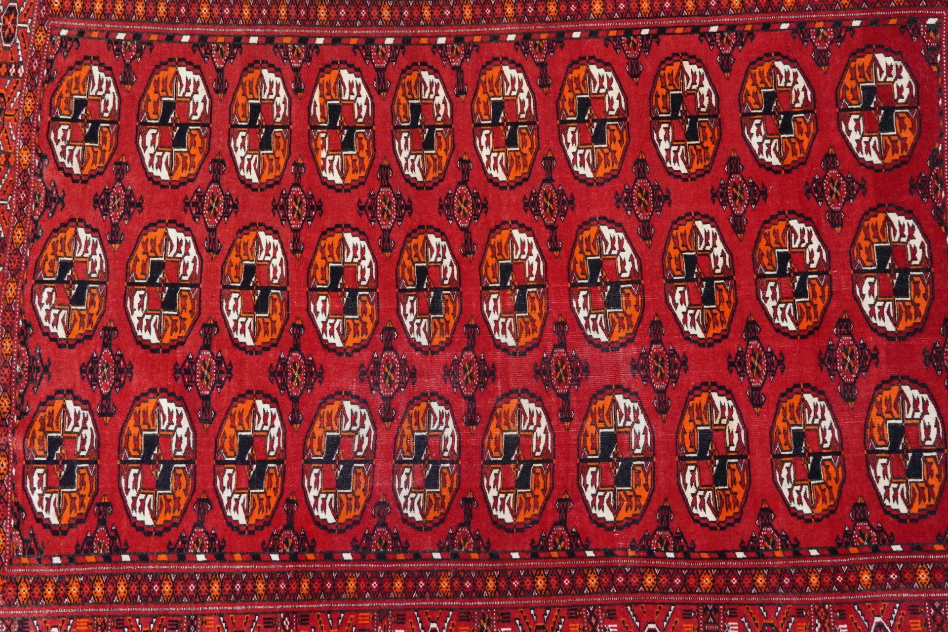 Rectangular Persian red ground rug having an allover repeat design, 170cm x 120cm : For further - Image 2 of 4