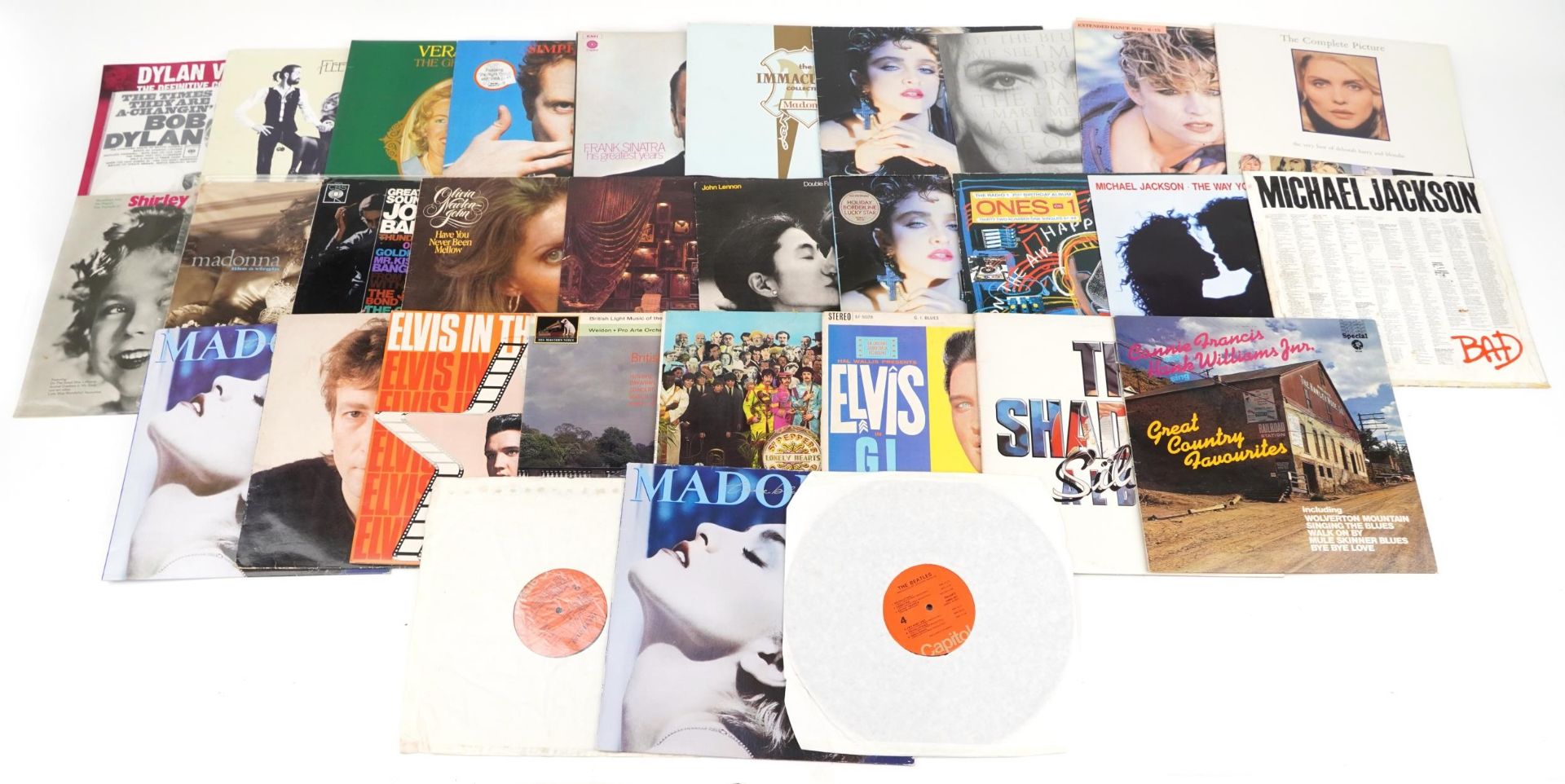 Vinyl LP records including Bob Dylan, Frank Sinatra, Fleetwood Mac, John Lennon & Yoko Ono and