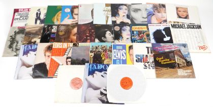 Vinyl LP records including Bob Dylan, Frank Sinatra, Fleetwood Mac, John Lennon & Yoko Ono and