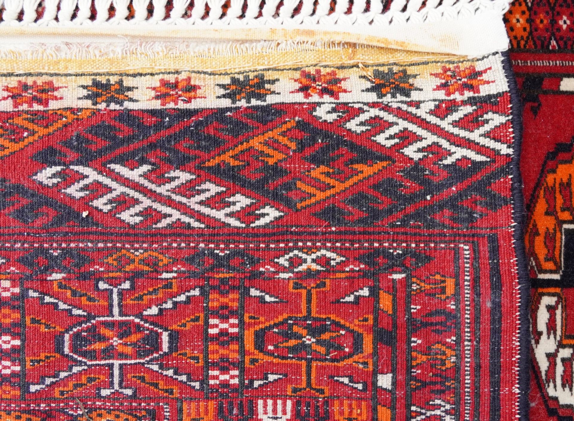 Rectangular Persian red ground rug having an allover repeat design, 170cm x 120cm : For further - Image 4 of 4