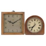 Two oak wall clocks including a George VI GPO electric example with Roman numerals, the largest 31cm