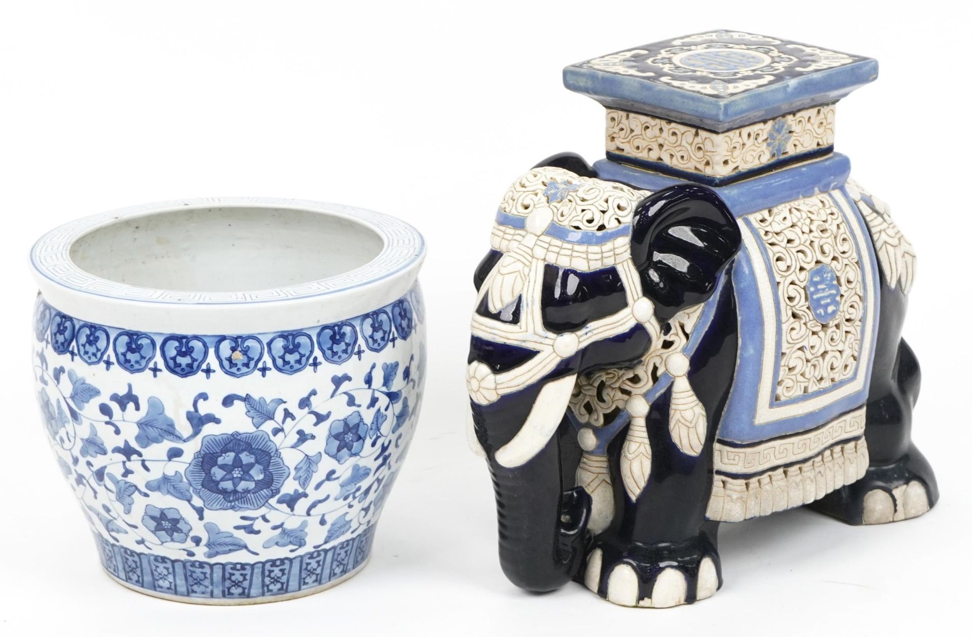 Chinese porcelain garden seat in the form of an elephant and blue and white jardiniere decorated