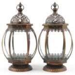 Pair of ornate copper hanging lanterns with glass panels, each 53cm high : For further information