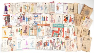 Collection of vintage sewing patterns including Leroy, Butterick, Simplicity, Style and Woman :