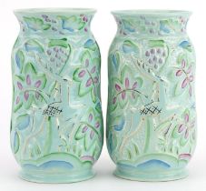 Crown Devon, pair of Art Deco vases hand painted and decorated in low relief with leaping deer
