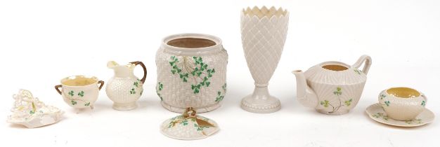 Belleek, Irish porcelain including vase, teapot and cauldron, the largest 20cm high : For further