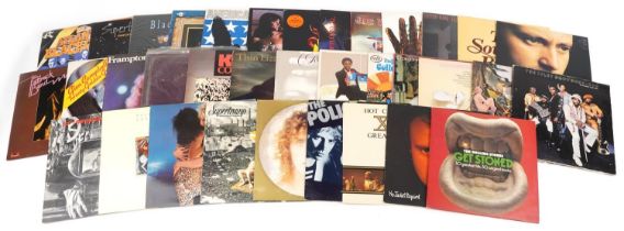 Vinyl LP records including The Jackson Five, Black Magic, Supertramp, Genesis, Thin Lizzy, Diana
