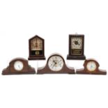 Five oak and mahogany mantle clocks including Smith Lever and Kieninger, the largest 36cm wide : For
