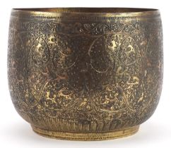 Indian brass jardiniere engraved with mythical animals amongst flowers, 20cm high x 25cm in diameter