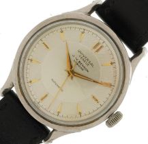 Universal Geneve, vintage gentlemen's stainless steel automatic wristwatch retailed by J W Benson,