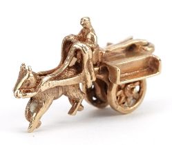 9ct gold horse drawn cart figure with rotating wheels, 2.4cm wide, 3.2g : For further information on