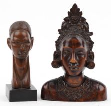 Two tribal interest carved hardwood busts including a Balinese example, the largest 26.5cm high :