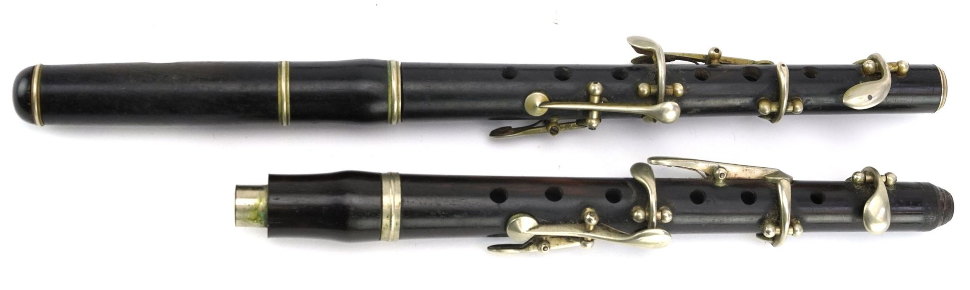 Three Victorian rosewood flutes, two with fitted cases including pieces stamped Beare & Sons of 34 - Image 11 of 13