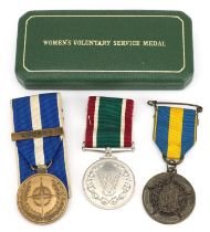 Three military interest medals including a Women's Voluntary Service medal with box : For further