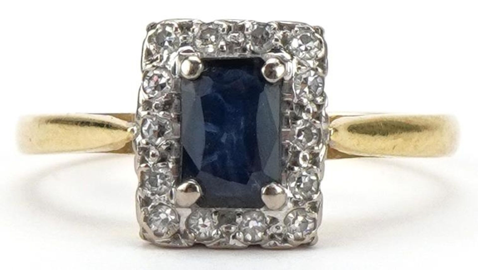 18ct gold sapphire and diamond ring, the sapphire approximately 6.77mm x 4.53mm x 2.55mm deep,
